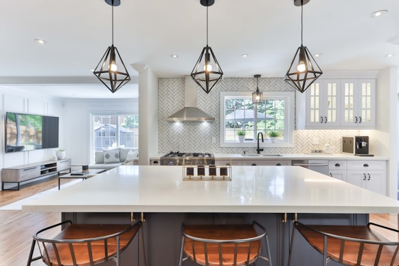 white wooden table with chairs