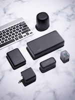 black android smartphone beside black smartphone