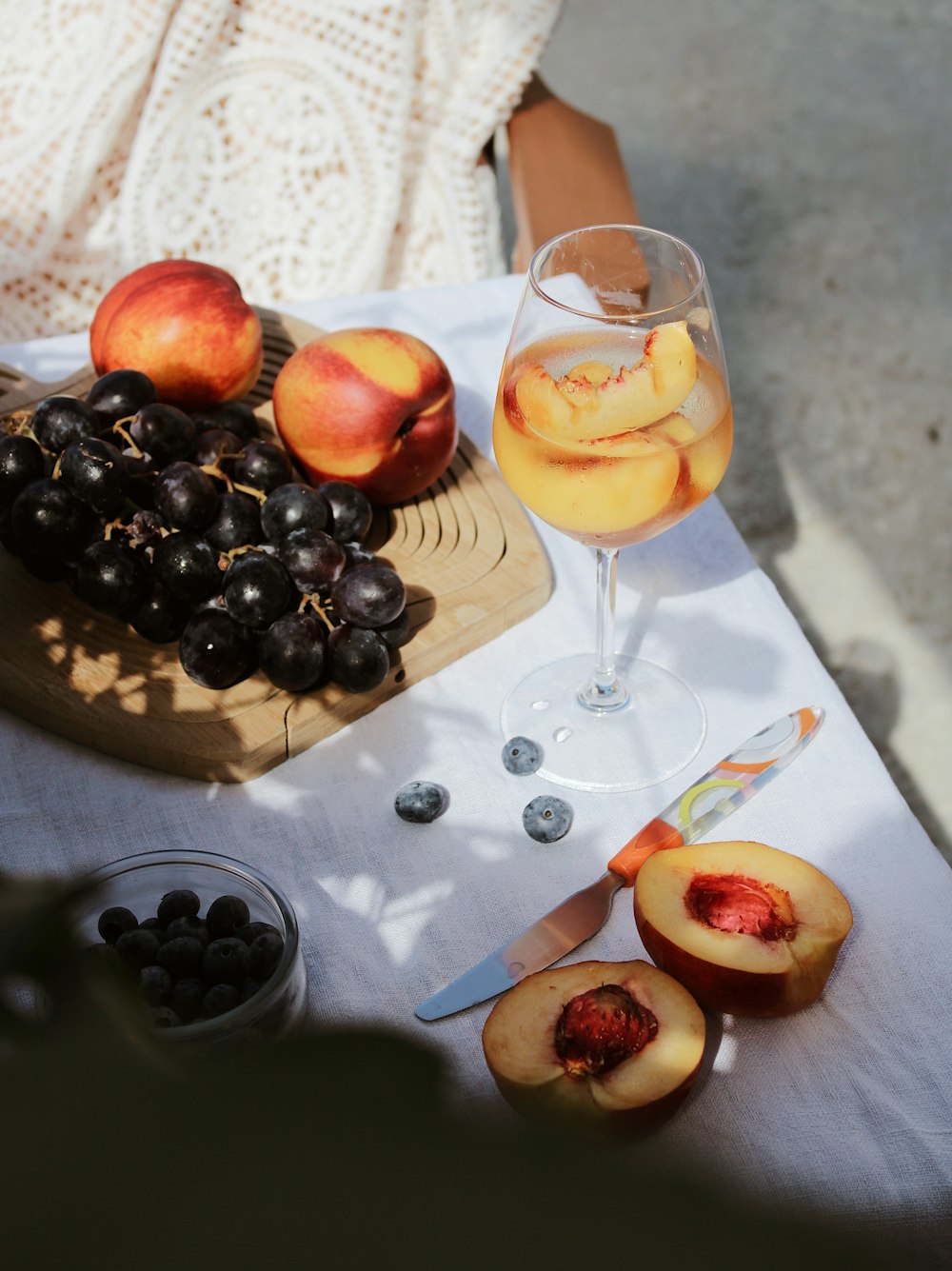 grapes and grapes on brown wooden tray