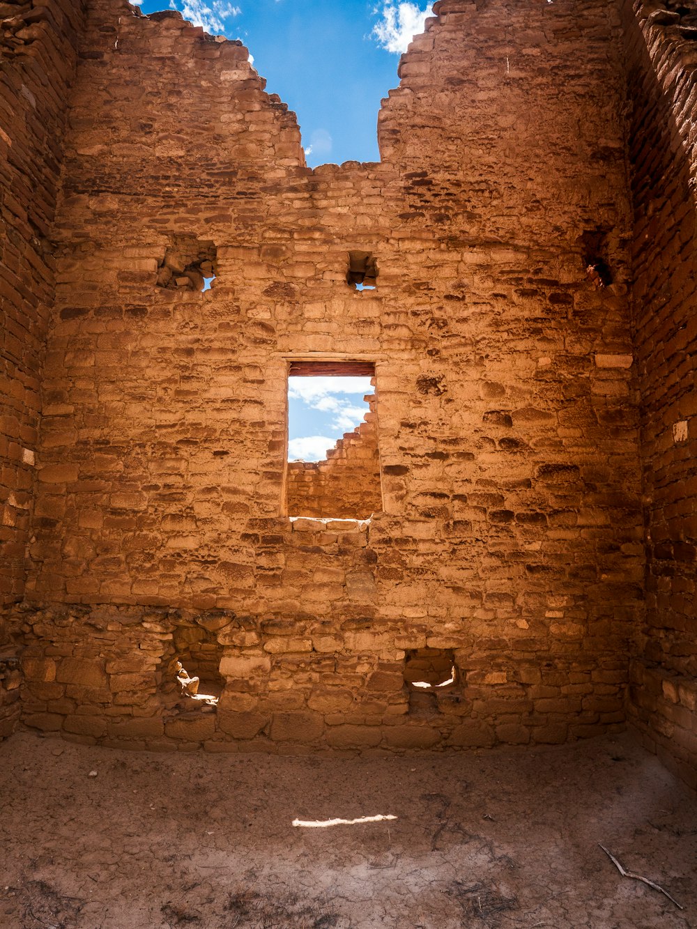 brown brick wall with white square frame