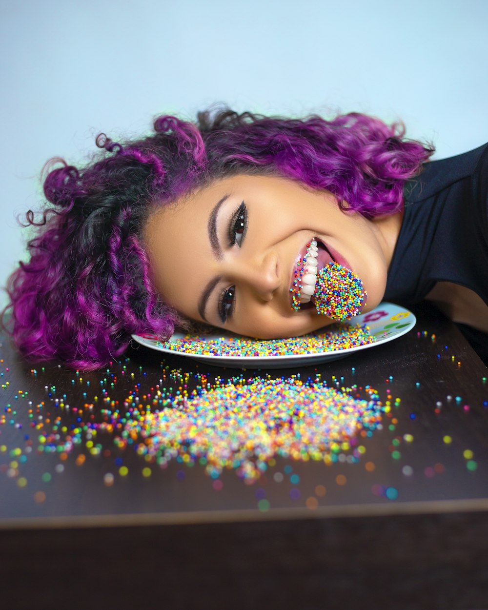 woman in black shirt with purple hair