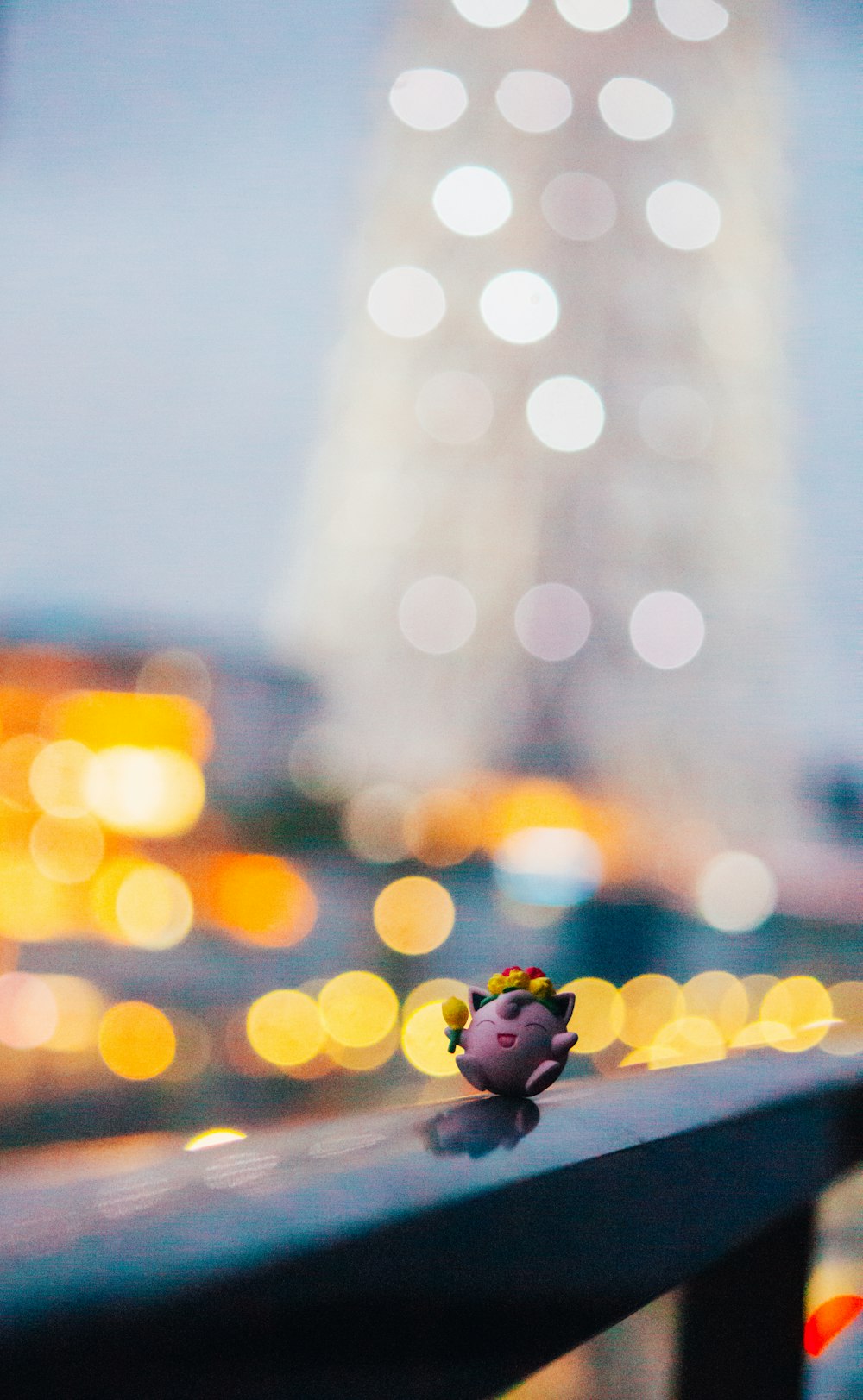 yellow and black bee figurine