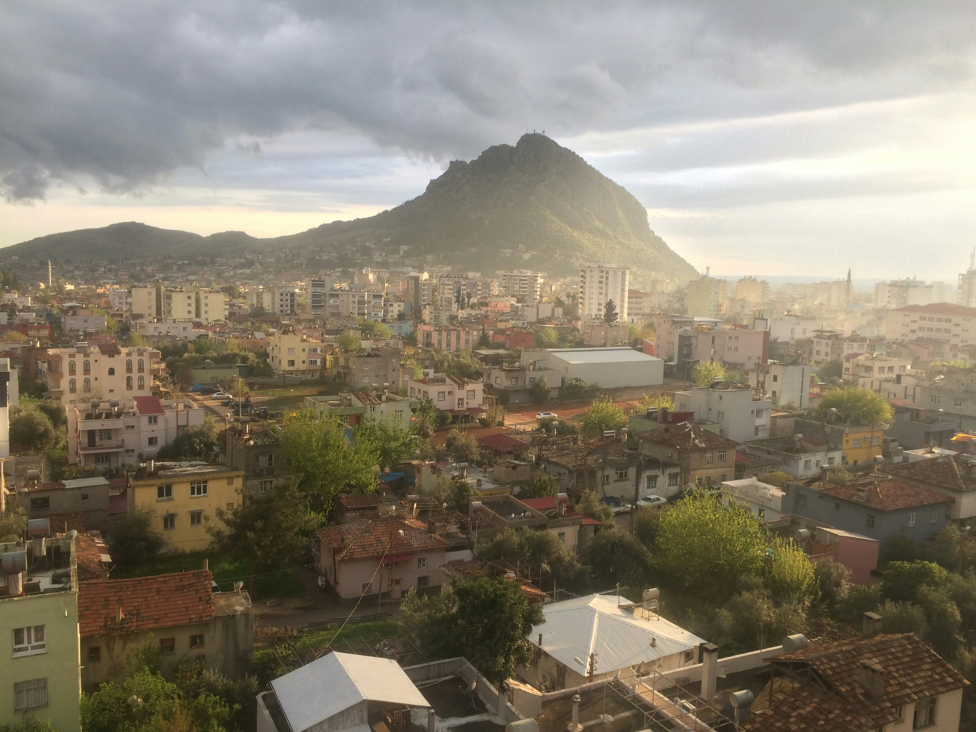 aerial view of city near mountain during daytime