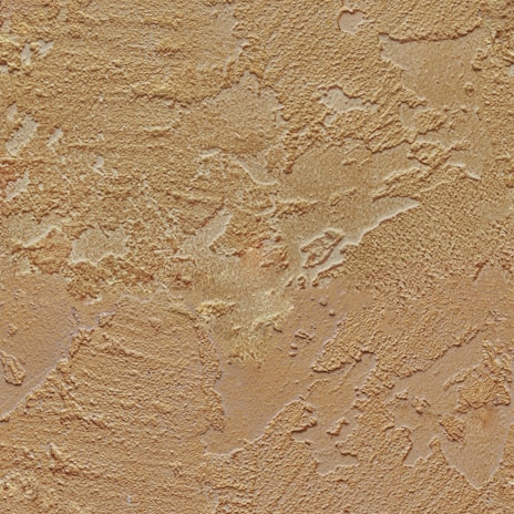 A textured surface with rough, irregular patterns resembling stucco or plaster. The surface appears to have varied depth and a weathered appearance, with different sections catching light differently.