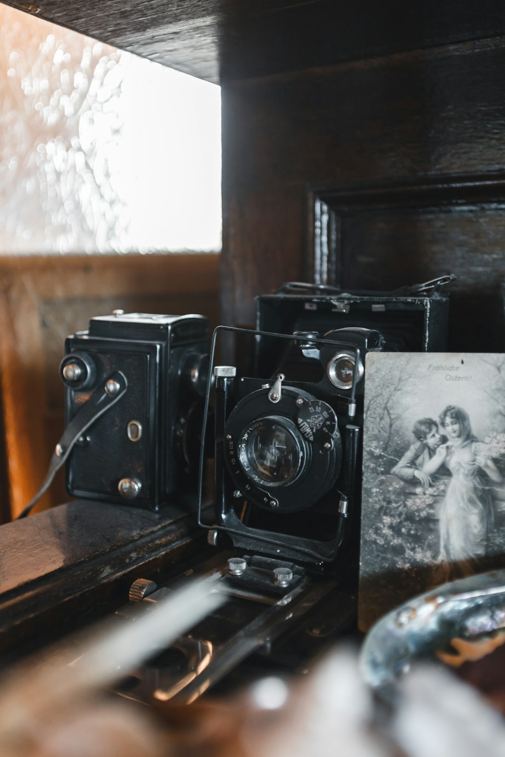 black camera on brown wooden table