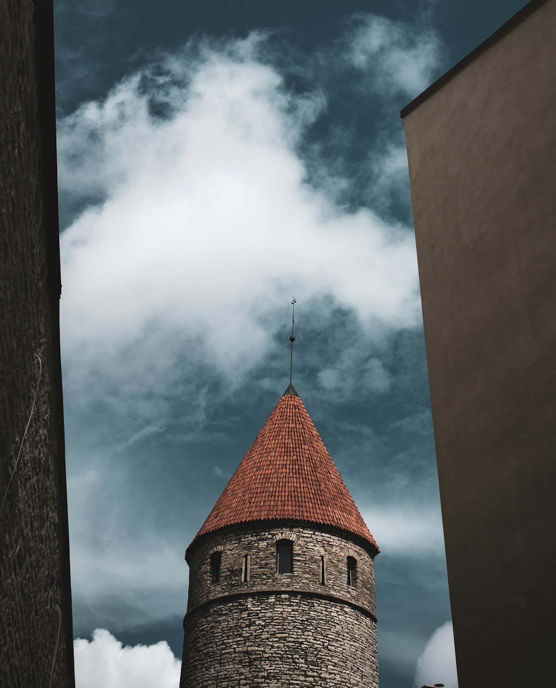 brown brick building under blue sky