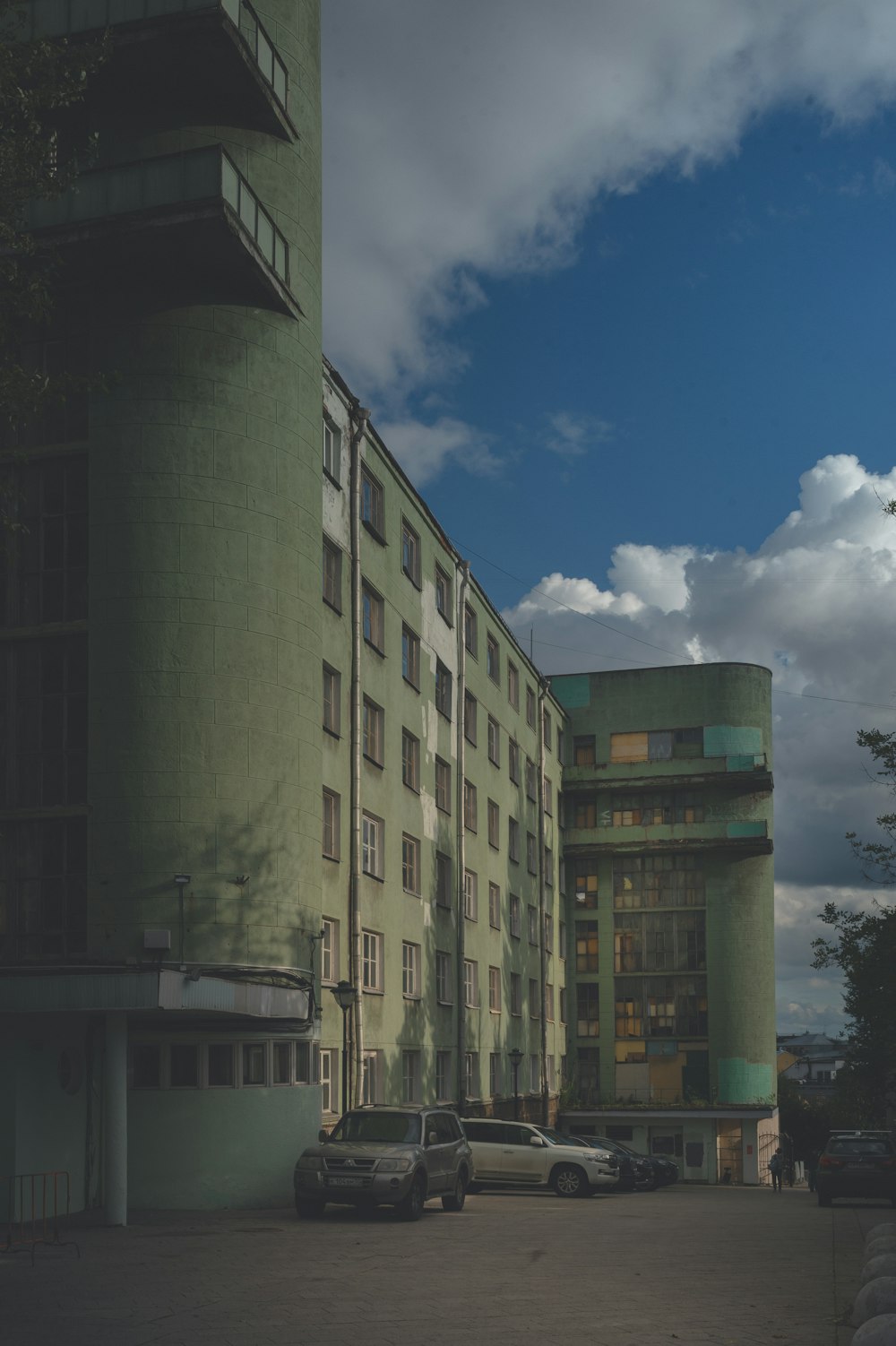 brown concrete building under blue sky during daytime