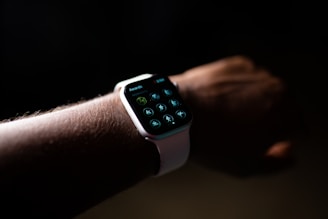 silver aluminum case apple watch with white sport band