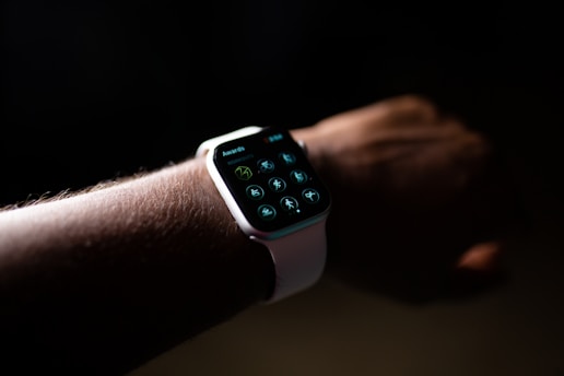 silver aluminum case apple watch with white sport band