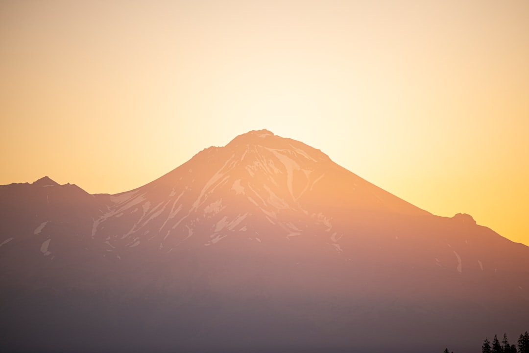 snow covered mountain during daytime