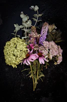 a bouquet of flowers sitting on top of a table