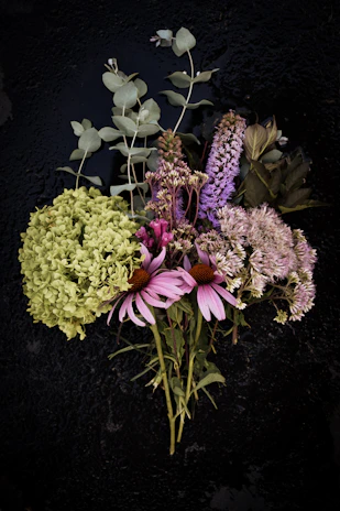a bouquet of flowers sitting on top of a table