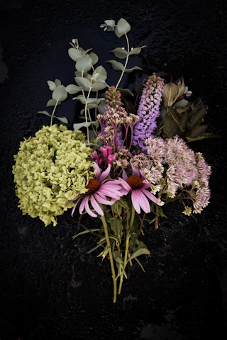 a bouquet of flowers sitting on top of a table