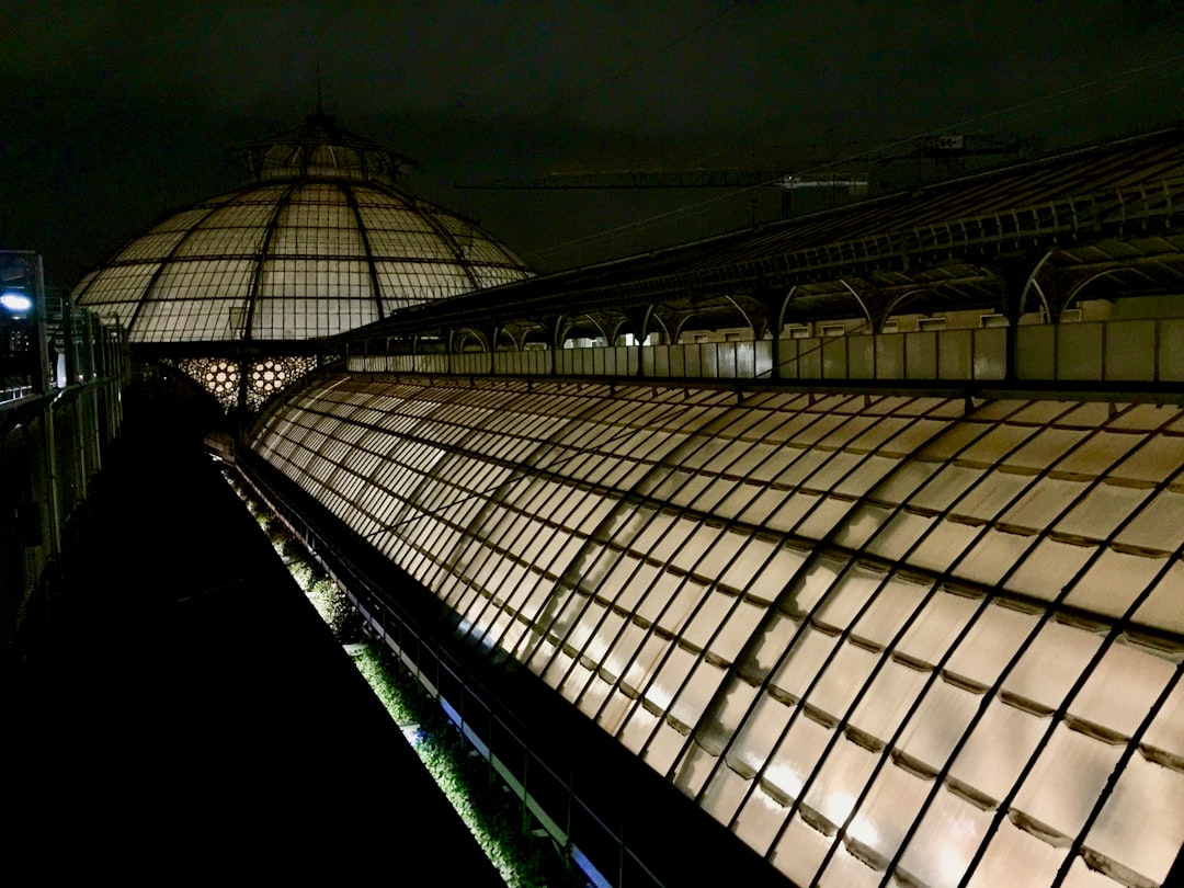 black metal frame roof during night time