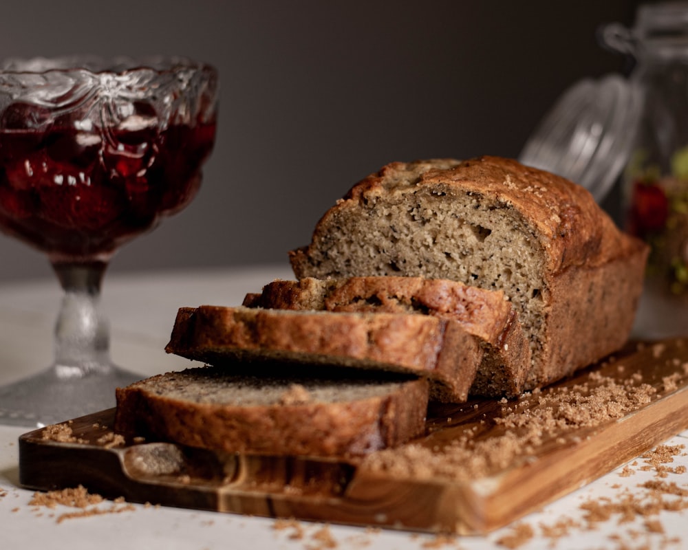 sliced bread on brown wooden chopping board