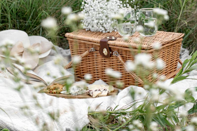 white flowers in brown woven basket
