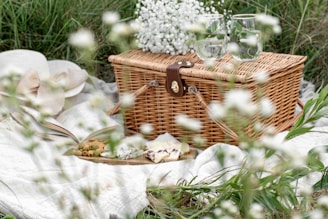white flowers in brown woven basket