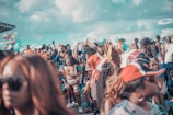 people gathering on a beach during daytime