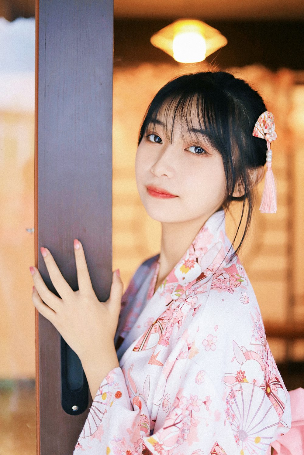 woman in white and red floral kimono