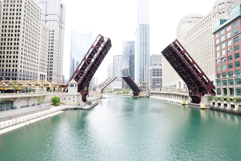 high rise buildings near body of water during daytime