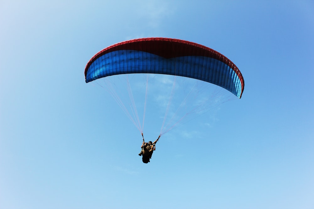 person in black and white parachute