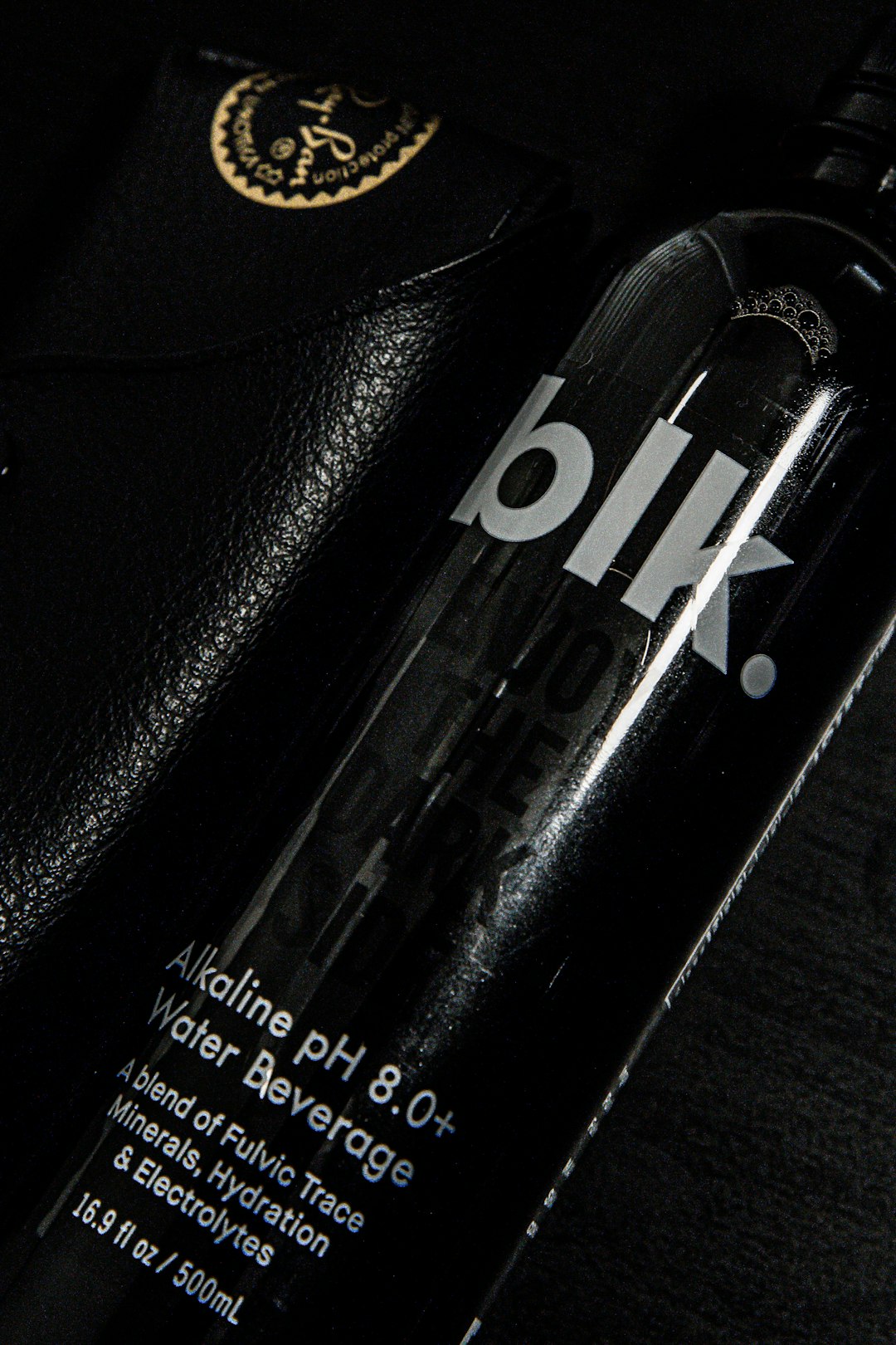 black and white labeled bottle