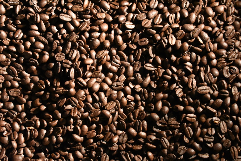 black coffee beans forming heart