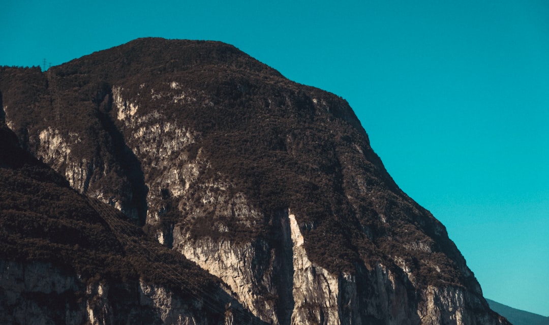 brown rocky mountain under blue sky during daytime