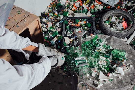 A recycling facility with workers processing hazardous waste materials.