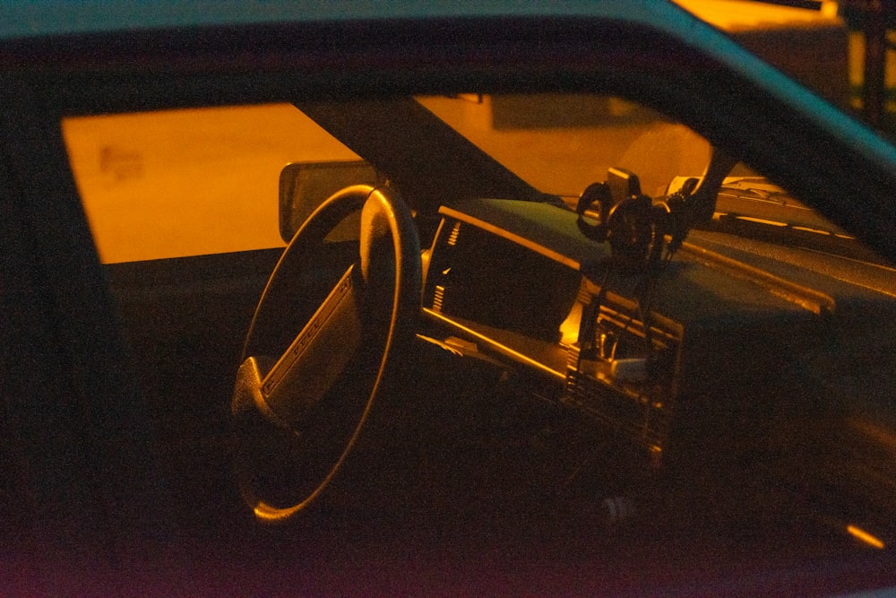 black car side mirror during night time