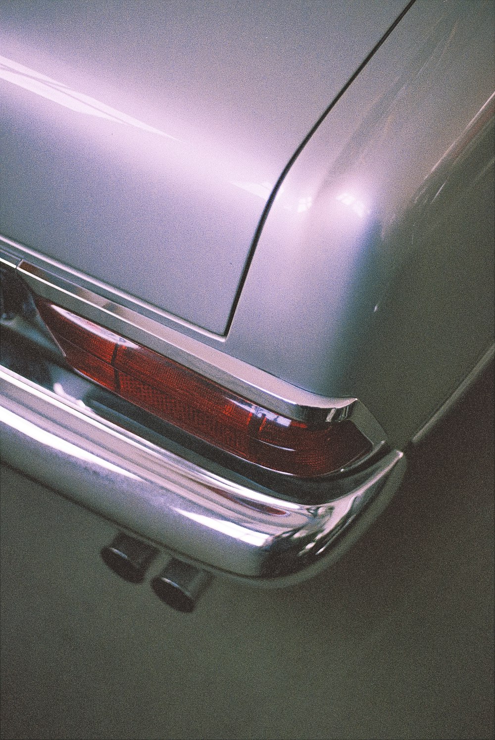 grey car with white license plate