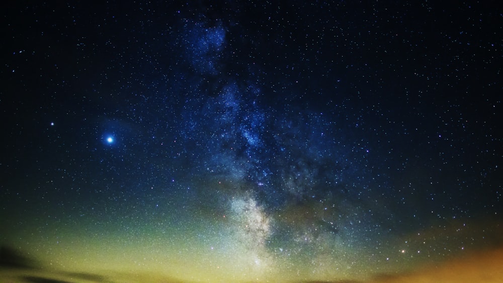 blue sky with stars during night time