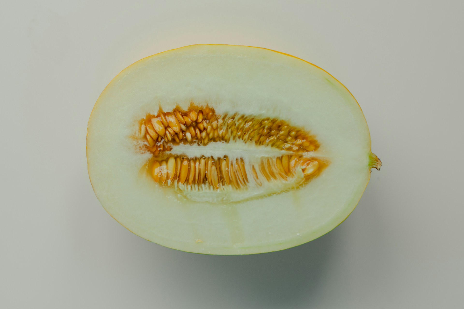 sliced lemon on white surface