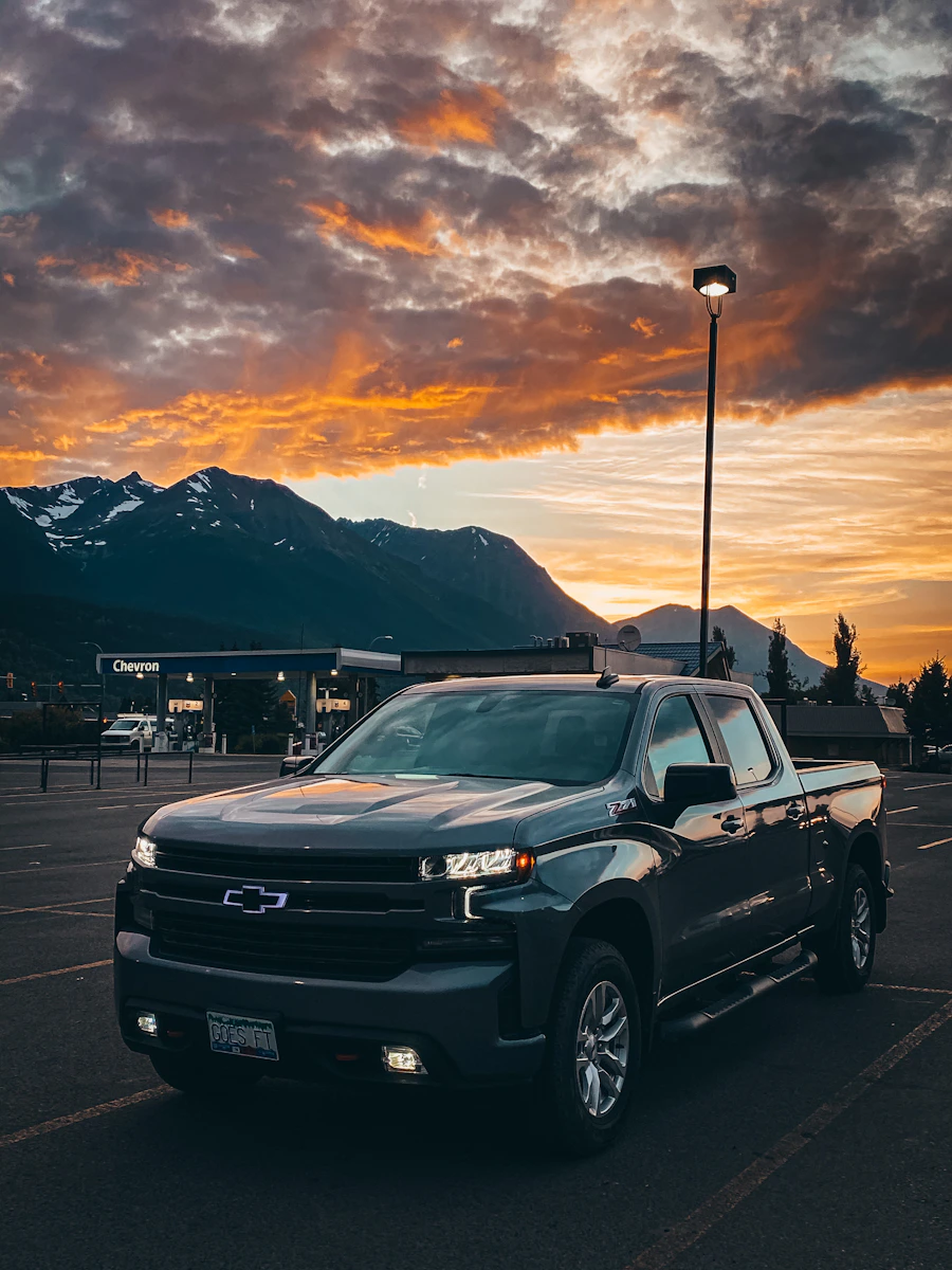 Chevrolet Silverado pickup truck beneath a dramatic evening sky