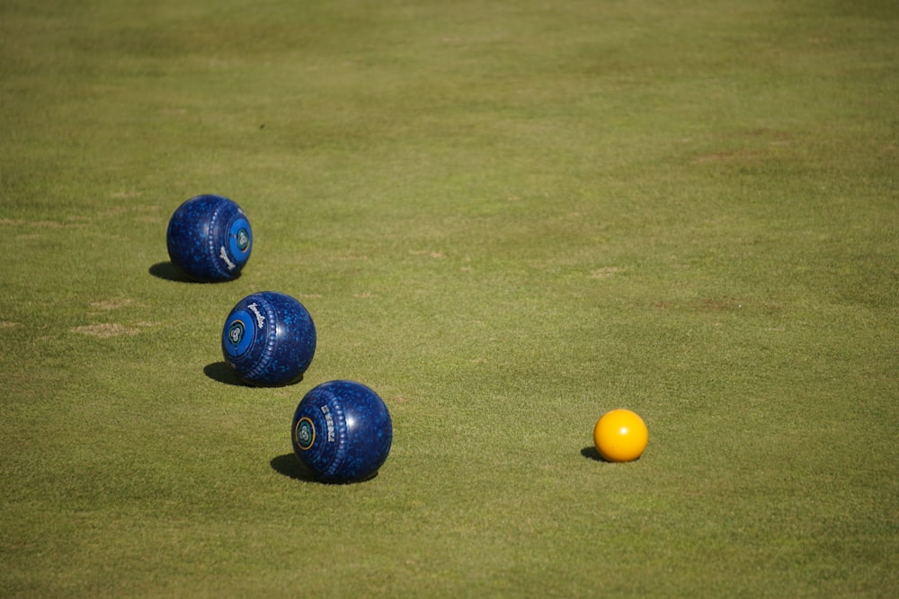 yellow ball on green grass field