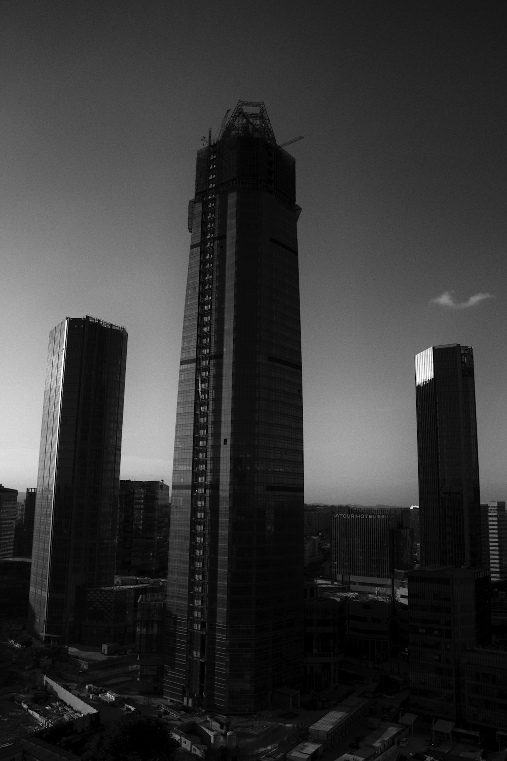 grayscale photo of high rise buildings