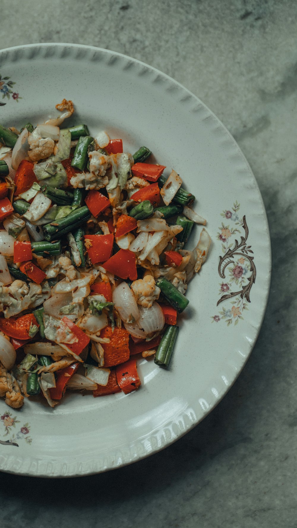 vegetable salad on white ceramic plate