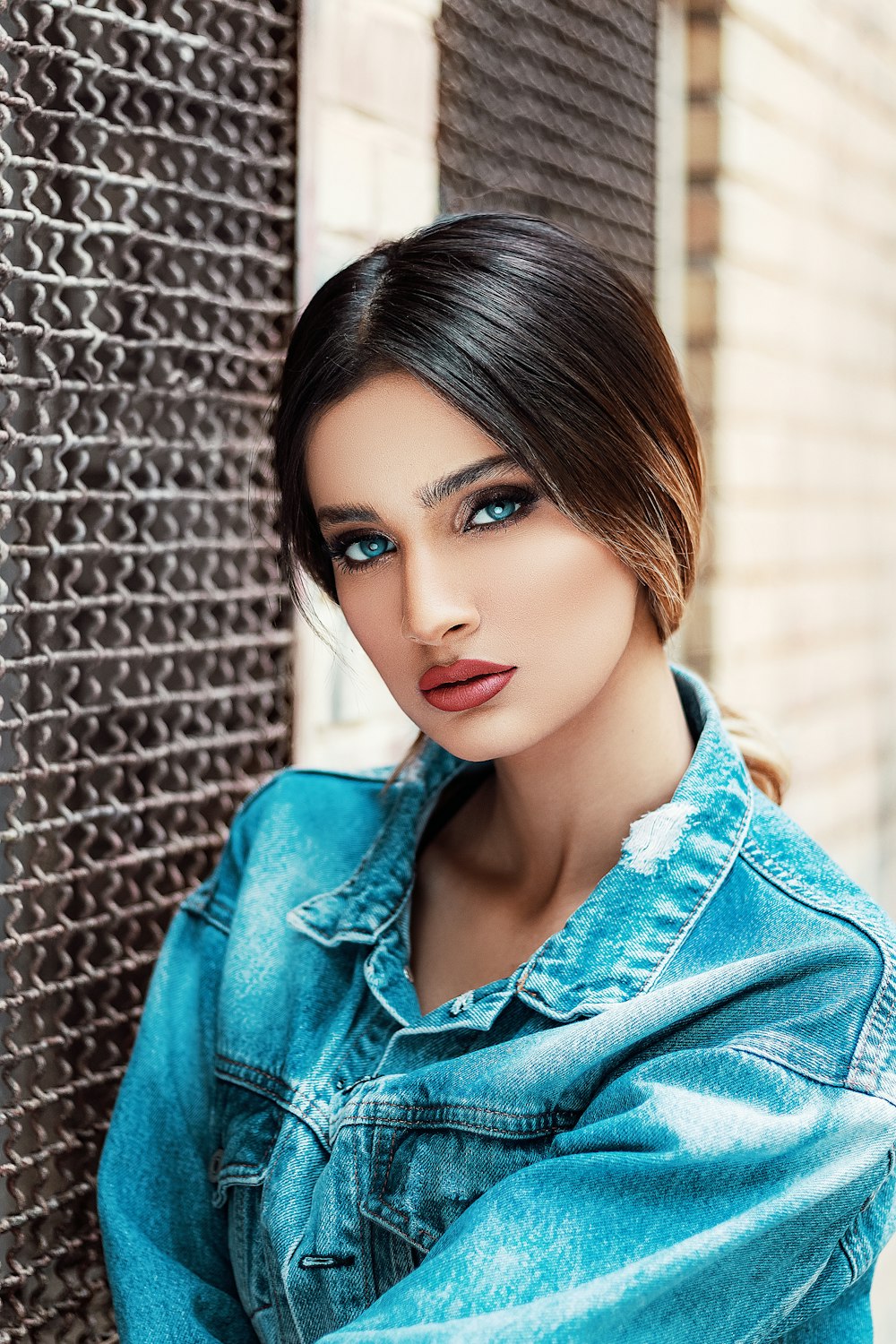 woman in blue denim button up jacket