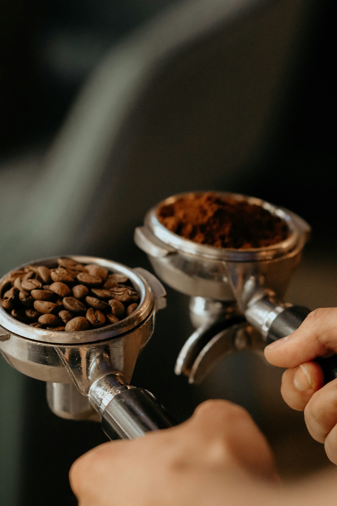 person pouring coffee on white ceramic cup