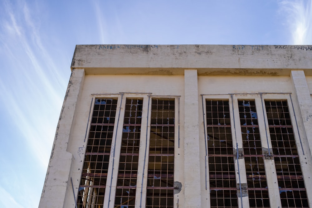 white concrete building under blue sky during daytime