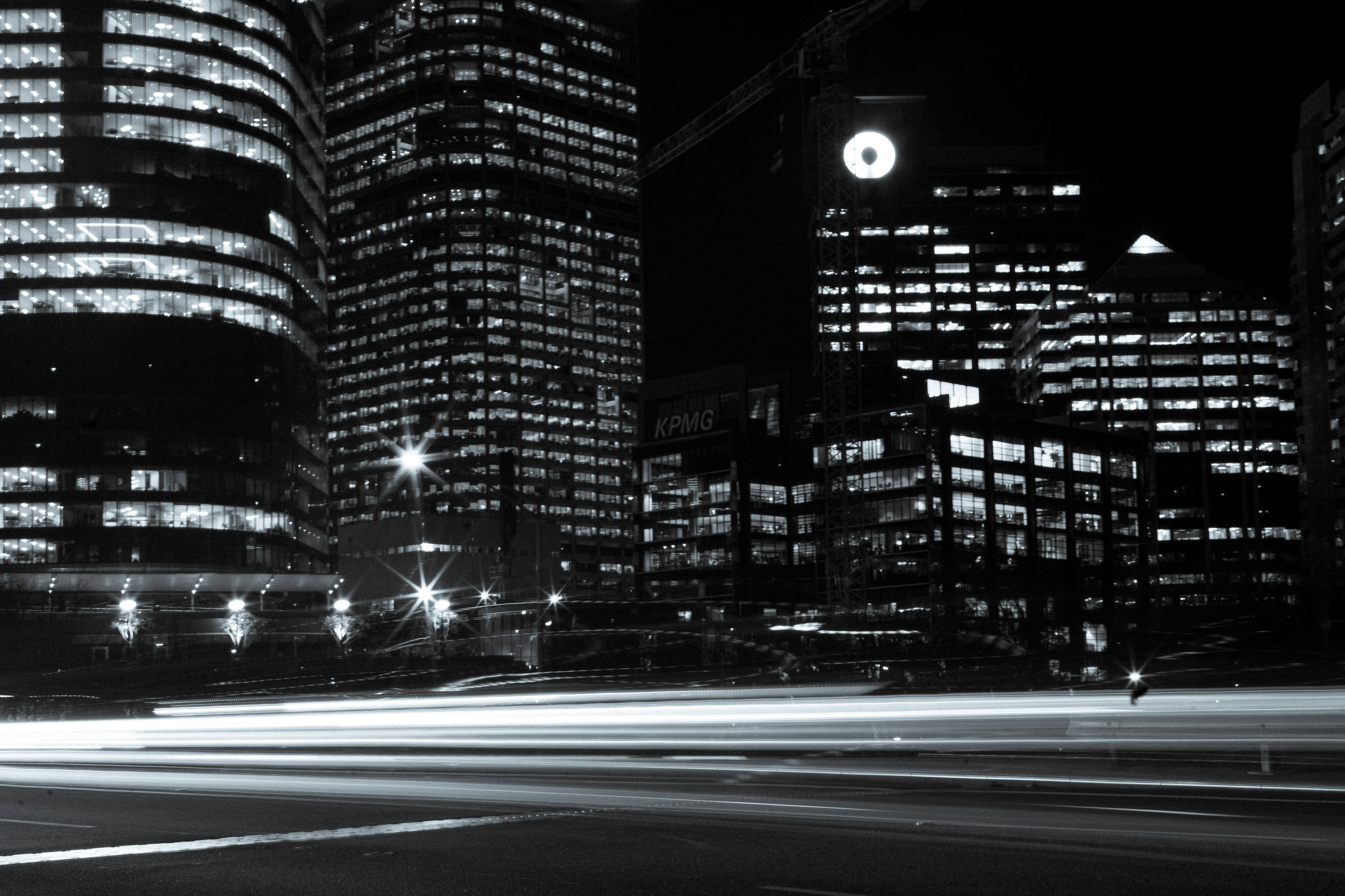 time lapse photography of city buildings during night time