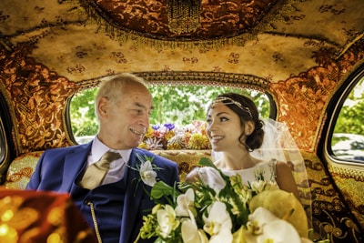 A happy couple with their new car.