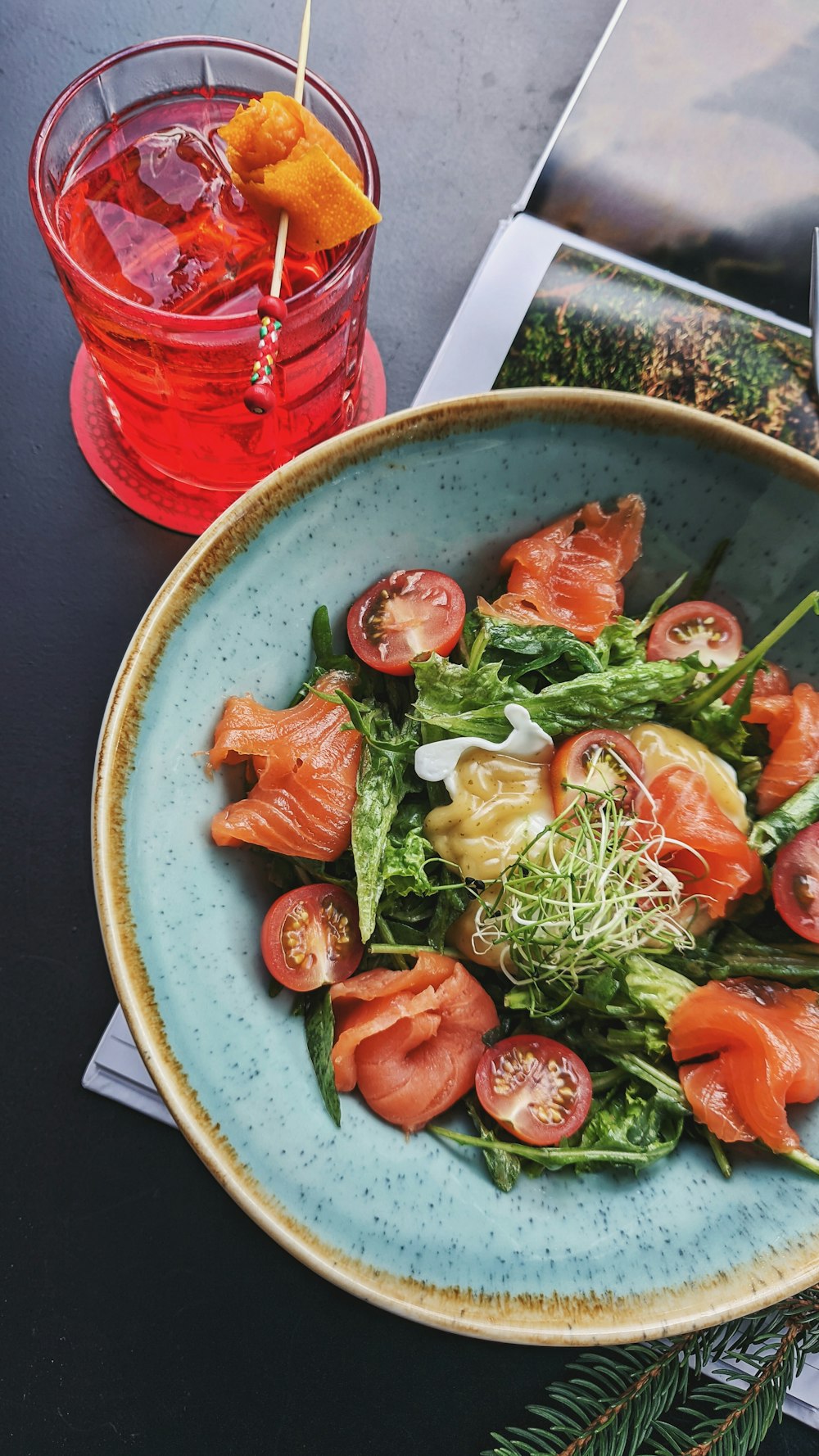 vegetable salad on blue and white ceramic bowl