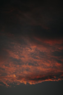 orange and black clouds during sunset