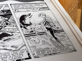 A black and white comic panel showing a person conversing with a dolphin in the water. Dialogue balloons contain text, one of which describes various meanings of the word 'Tikiti', and another commenting on how communication depends on the movement of a tail. The setting suggests an interaction involving communication with animals, probably in the context of understanding or language exploration.