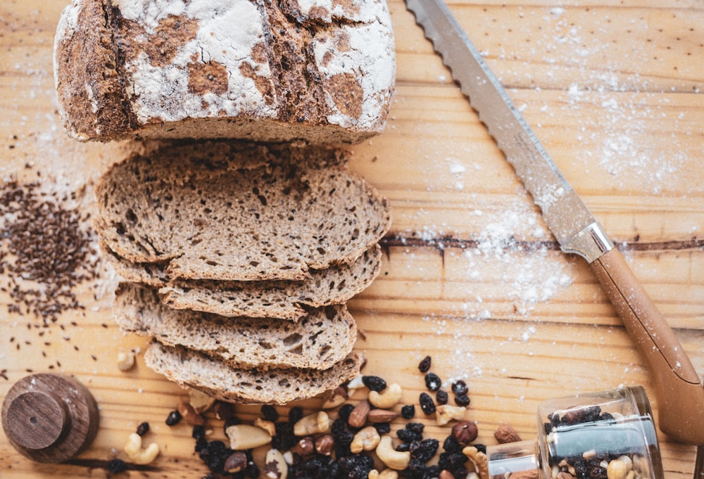 brown and white bread on brown wooden table