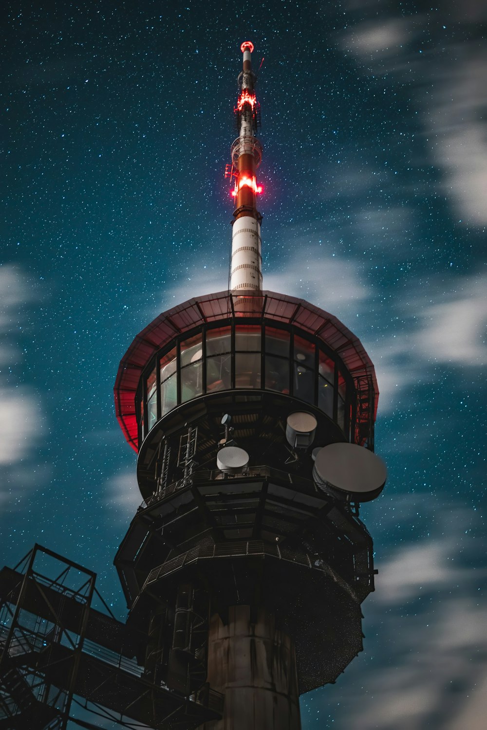 black and red tower under blue sky