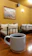 A cheerful terrier-themed mug filled with coffee on a cozy wooden desk.