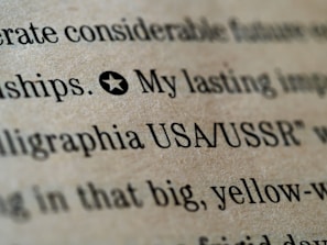 Close-up of a print highlighting the American Revolution with textured paper and bold typography