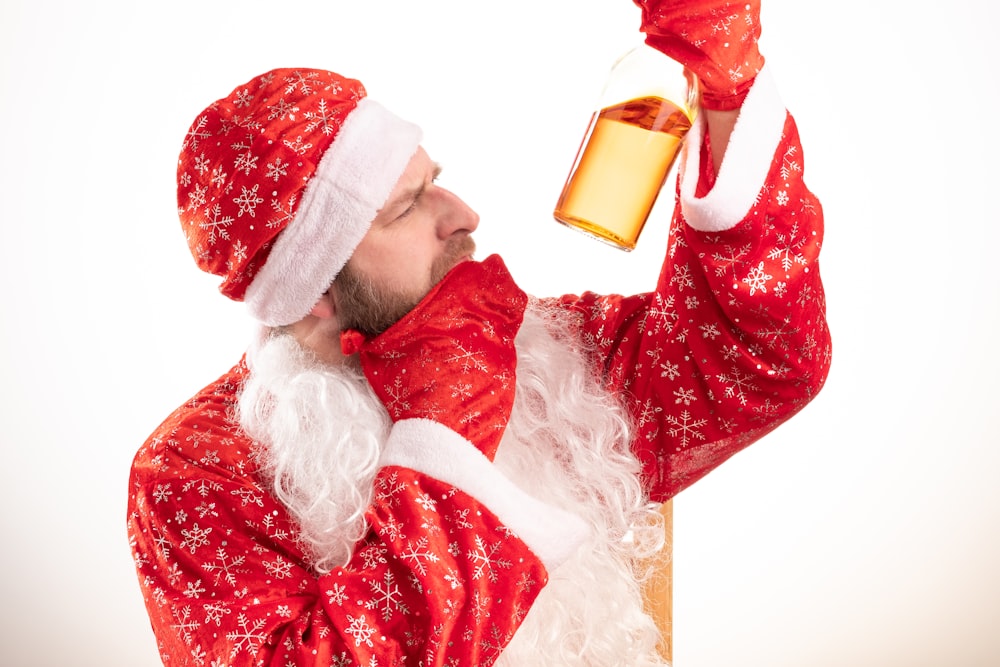 santa claus holding yellow mug